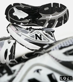 کفش کتانی مردانه و زنانه طوسی مشکی سفید NEW BALANCE 1064 V.2