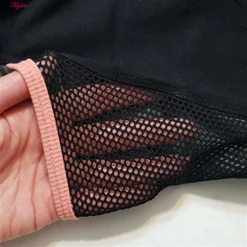 ست نیم‌تنه و شلوارک ورزشی زنانه مدل جیب‌دار کد 5229-534