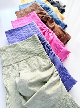 شورتک ورزشی سیملس پشت چروک سنگ شور