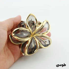 کلیپس دخترانه مدل شیشه ای طرح گل دور طلایی (طوسی)