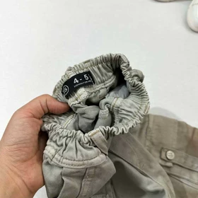 شلوار دخترانه جین بگ شافل زیتونی