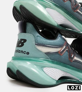 کفش کتانی مردانه و زنانه طوسی سبز NEW BALANCE More Trail v3