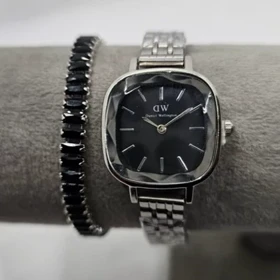 ساعت مچی زنانه DW آینه ای صفحه مشکی بند سیلور