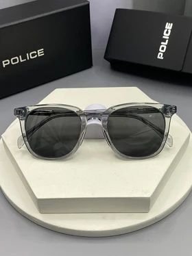 عینک آفتابی پلیس مدل 8815 با عدسی پلی‌کربنات پلاریزه فریم ترکیبی مقاوم و وزن فوق سبک