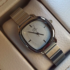 ساعت مچی زنانه دفرم DW طرح جولیوس بند استیل صفحه سفید