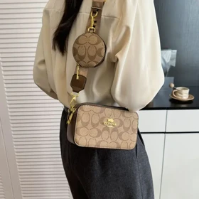 کیف دوشی زنانه وارداتی طرح coach کد665 (نسکافه ای روشن)