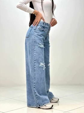 شلوار فول بگ آبی زاپ‌دار کمرسرخود جلو دکمه پارچه ترک