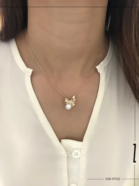 گردنبند پاپیون آینه‌ای مرواریددار