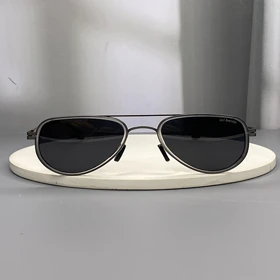 عینک آفتابی آیس‌برلین با فریم تیتانیوم و لنز پلی‌کربنات پلاریزه UV400 انعطاف‌پذیر و نشکن