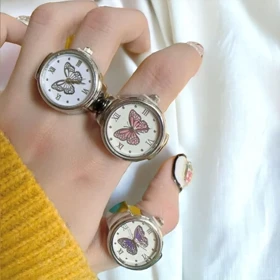 ساعت انگشتری زنانه بند کشی استیل طرح پروانه صورتی