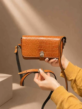 کیف چرم زنانه عسلی نارنجی ابر و بادی سنگی چرم اصل گاوی