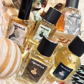 عطر زنانه میدنایت پویزن