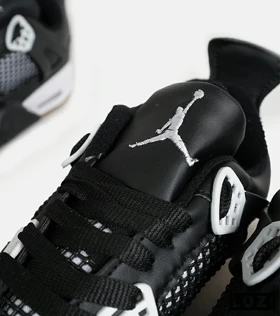 کتانی ساق‌دار بزرگ پا مشکی سفید Nike air jordan 4