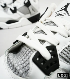 کتانی ساق‌دار زنانه سفید مشکی Nike air jordan 4