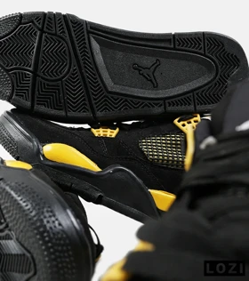 کفش کتانی ساق‌دار مردانه مشکی زرد Nike air jordan 4