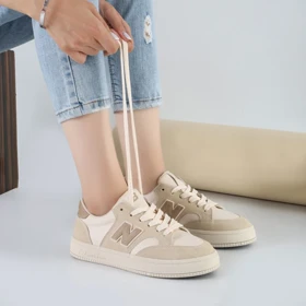 کفش و کتانی اسپرت زنانه و دخترانه مدل نیوبالانس NEW BALANCE رنگ کرم