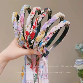 تل سر دنباله دار مروارید بافت