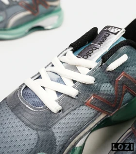کفش کتانی مردانه و زنانه طوسی سبز NEW BALANCE More Trail v3 مدل 5240