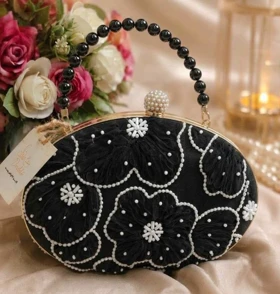 کیف مجلسی زنانه مدل روشان مشکی سفید طلایی