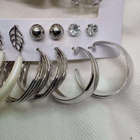 پک 9 عددی گوشواره استیل طرح «میکس ترند» | شامل حلقه‌ای، مرواریدی و میخی نگین‌دار