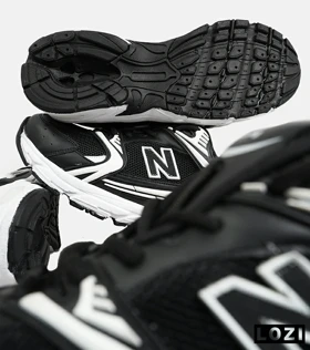 کفش کتانی مردانه و زنانه مشکی سفید NEW BALANCE 530