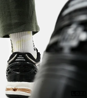کفش کتانی مشکی طلایی Newbalance 1906R