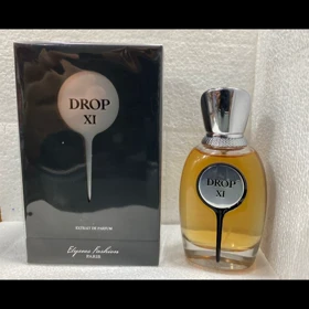 ادکلن دراپ Xi اکستریت 100 میل (رایحه مشابه ایو سن لورن بیبی کت)