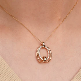 پلاک زیبا از برند ژوپینگ نگین ها مخراج کاری شده رنگ طلایی