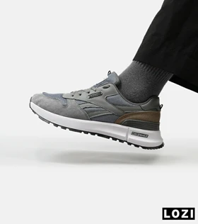 کفش کتانی طوسی سیر REEBOK Unphased Pro