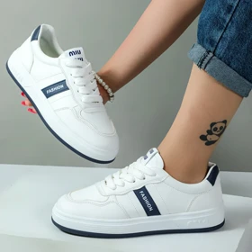 کفش کتانی ونس زنانه مدل فشیون fashion رنگ سفید سرمه ای