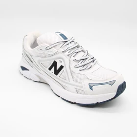 کتانی نیوبالانس 1064 سفید سرمه ای بزرگپا کد 545400