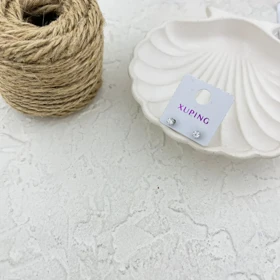 گوشواره زنانه نگین تک، ظریف و درخشان با طرح ژوپینگ