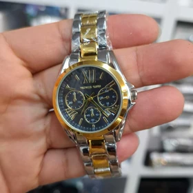ساعت مچی زنانه مایکل کورس Michael Kors موتور کوارتز باکیفیت و طراحی زیبا (بنده نقره ای طلائی صفحه مشکی)