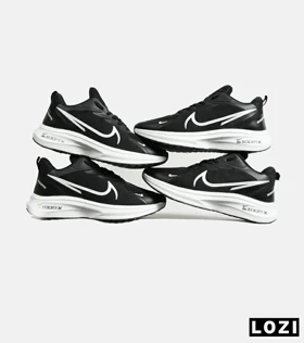 کفش کتانی مردانه مشکی سفید NIKE zoom x