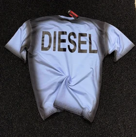 تیشرت دیزل باکسی رنگ آبی فیروزه ای با حاشیه مشکی پیسوله پارچه ماکان درجه یک کیفیت بالا