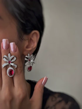 گوشواره جواهری پاپیونی آویزدار تمام نگین