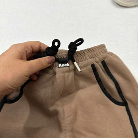 شلوار جاگر دورس لاینردار طرح MM لبخند