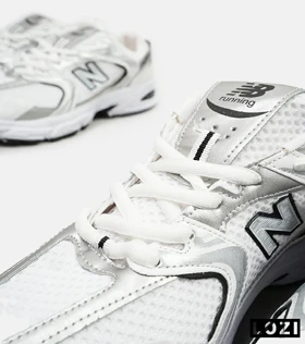 کفش کتانی مردانه و زنانه سفید نقره ای NEW BALANCE 530 مدل 3143