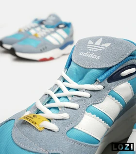 کفش کتانی مردانه آبی فیلی سفید ADIDAS torsion