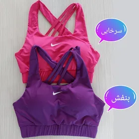 نیم‌تنه ورزشی زنانه پشت رومی نایک