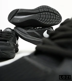 کفش کتانی مردانه و زنانه مشکی خاکستری Nike guide 10