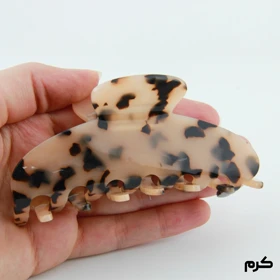 کلیپس دخترانه مدل خرچنگی خال‌خالی (کرم)