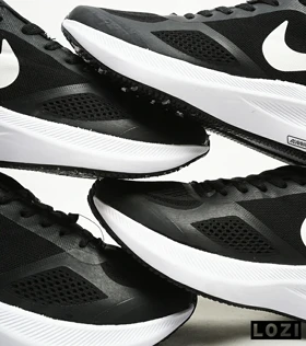 کفش کتانی بزرگ پا مشکی سفید Nike guide 10