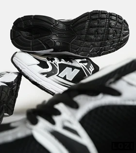 کفش کتانی مردانه و زنانه مشکی سفید NEW BALANCE 530