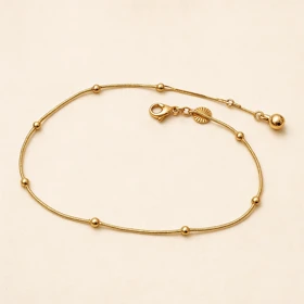 پابند استیل طلایی زنانه مدل مینیمال با مهره برجسته – Xuping