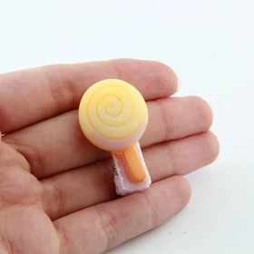 گیره مو دخترانه مدل آب نبات (زرد)