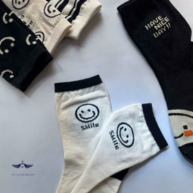 جوراب ساق‌دار سفید و مشکی طرح لبخند مستر ساکس