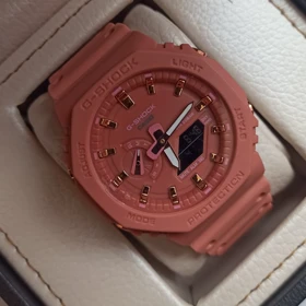 ساعت مچی طرح کاسیو جیشاک 2100 پمپی گلبهی تیره