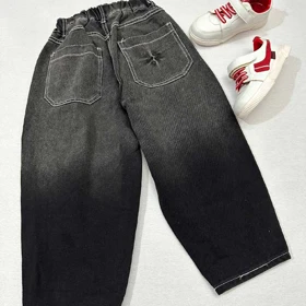 شلوار جین سنگ شور شده با دوخت سفید