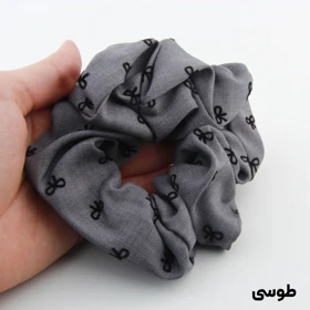 کش مو دخترانه مدل پاپیونی پارچه ای (طوسی)